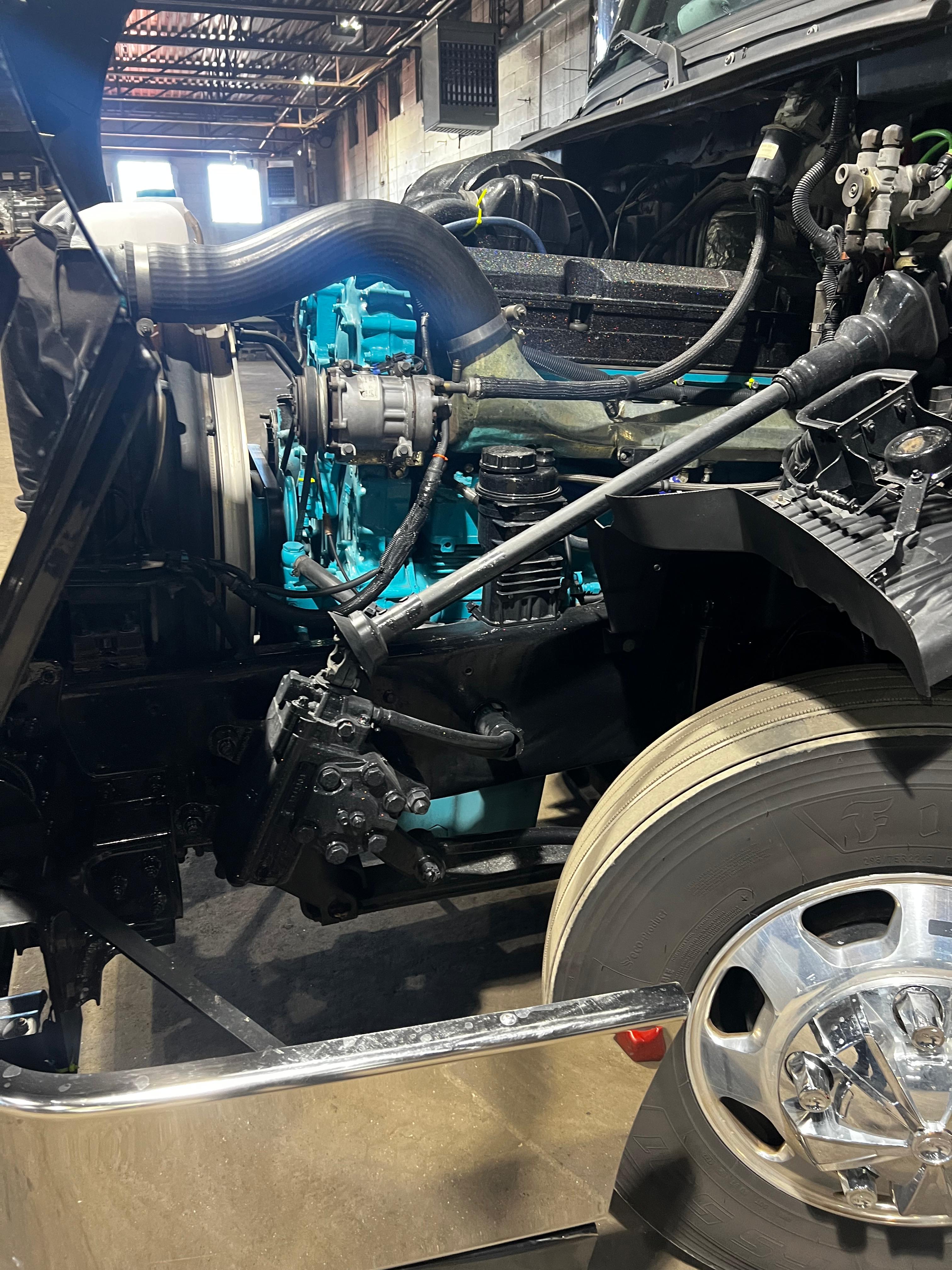 Open engine bay of a serviced truck at Somet Truck Center